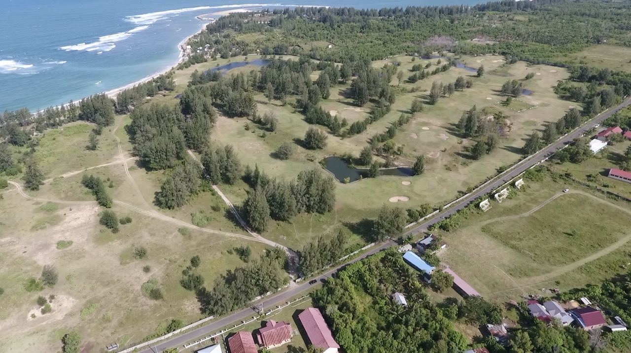 Lhoknga Golf Course — aerial view with beach and Indian Ocean
